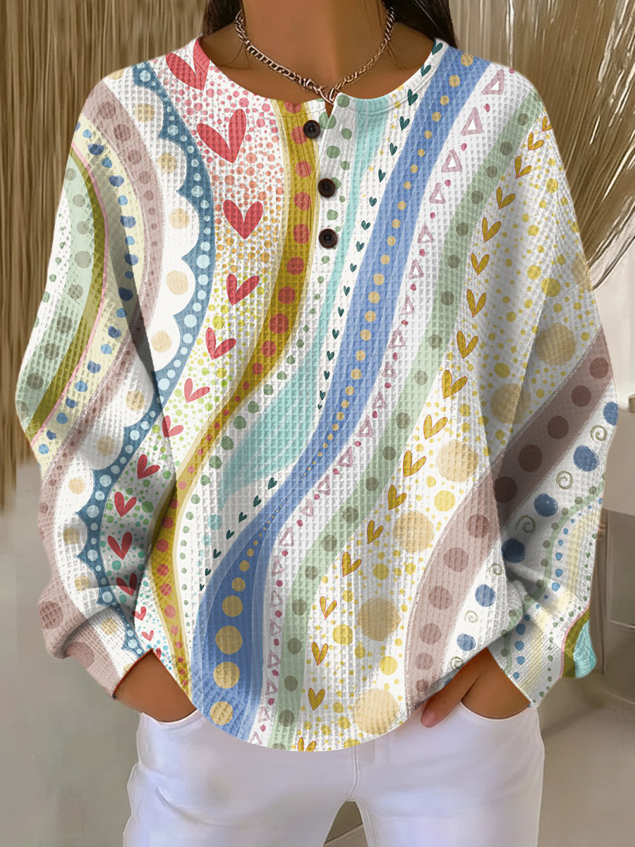 Luna | Suéter con Patrones de Rayas Coloridos